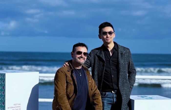 Portrait of Roberto F. Canuto and Xu Xiaoxi at the 62 FICX Gijon International Film Festival photocall, 2024.