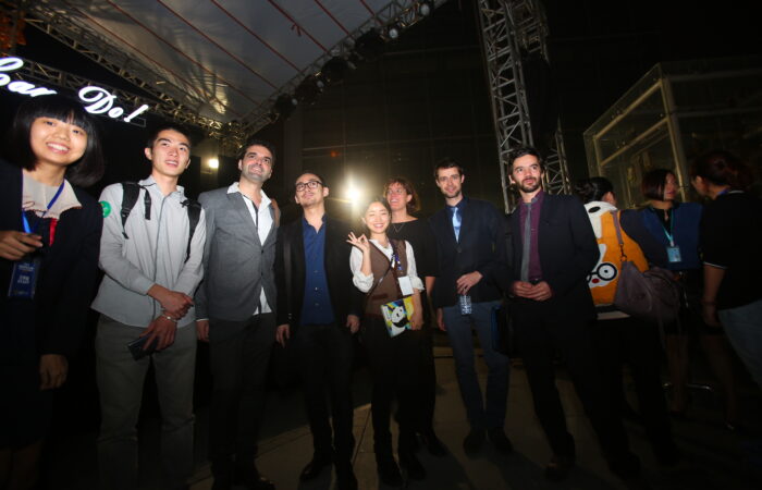 Film directors Roberto F. Canuto and Xu Xiaoxi with fellow jury members at a short film festival in Chengdu.
