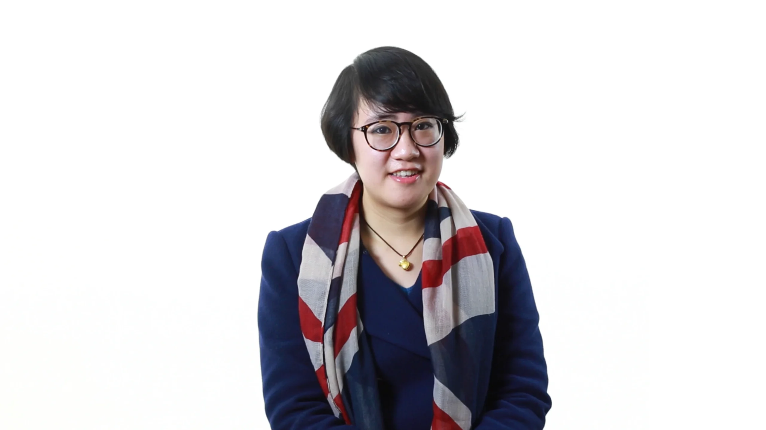 Still from the corporate tribute video for New Oriental School’s 10th anniversary (2013), teachers and staff reflecting on experiences in Beijing, China