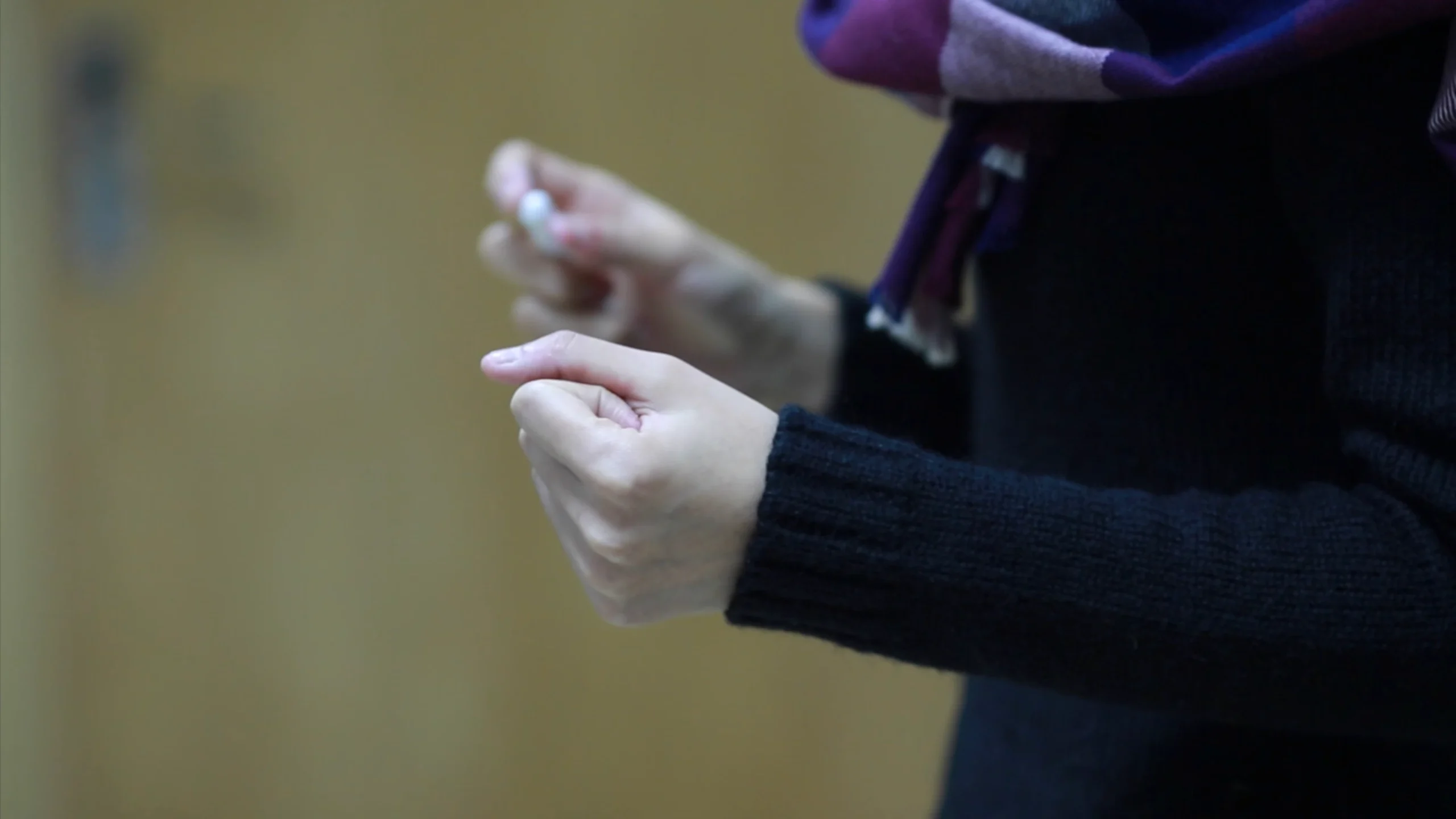 Still from the corporate tribute video for New Oriental School’s 10th anniversary (2013), teachers and staff reflecting on experiences in Beijing, China