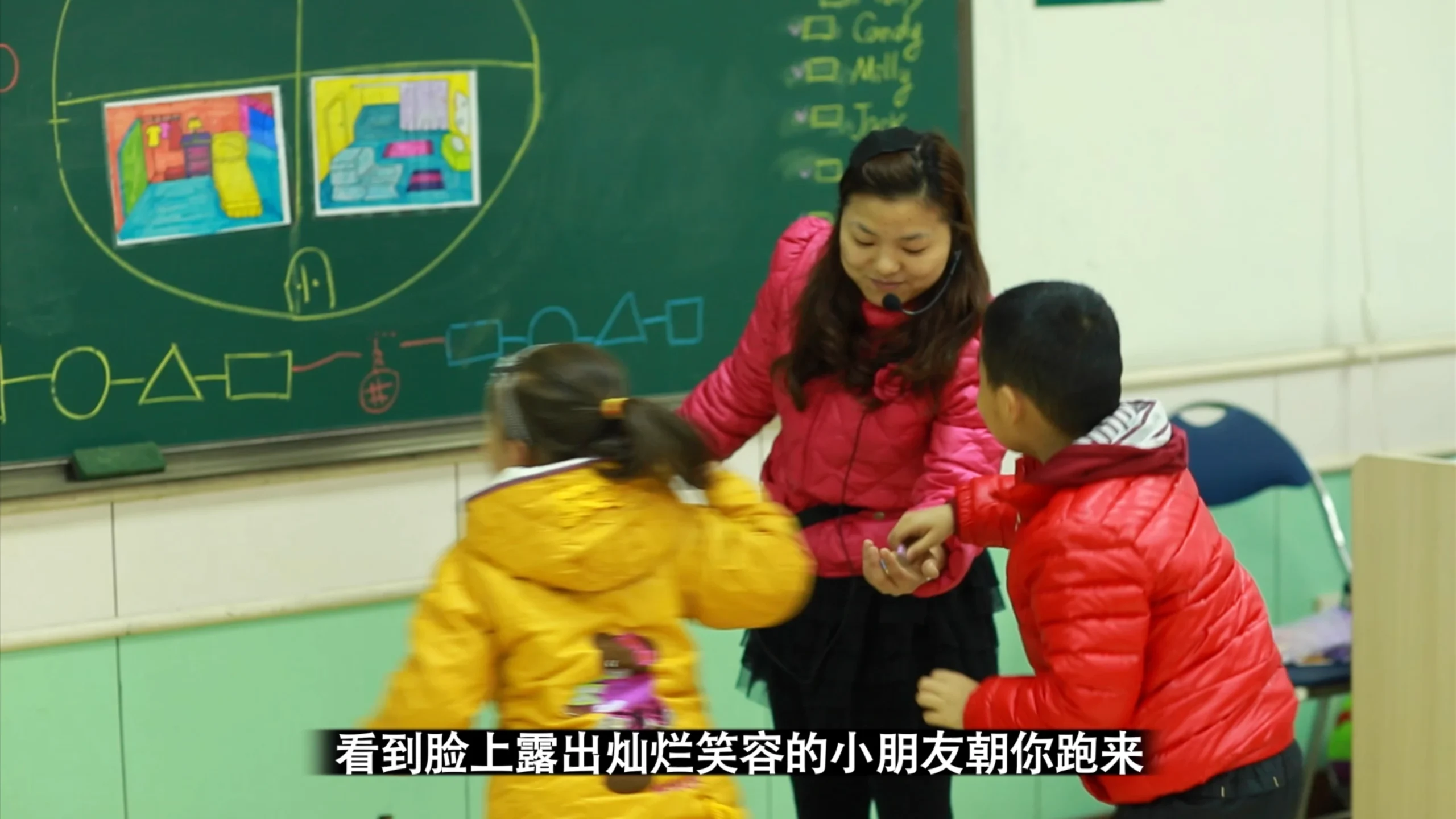 Still from the corporate tribute video for New Oriental School’s 10th anniversary (2013), teachers and staff reflecting on experiences in Beijing, China