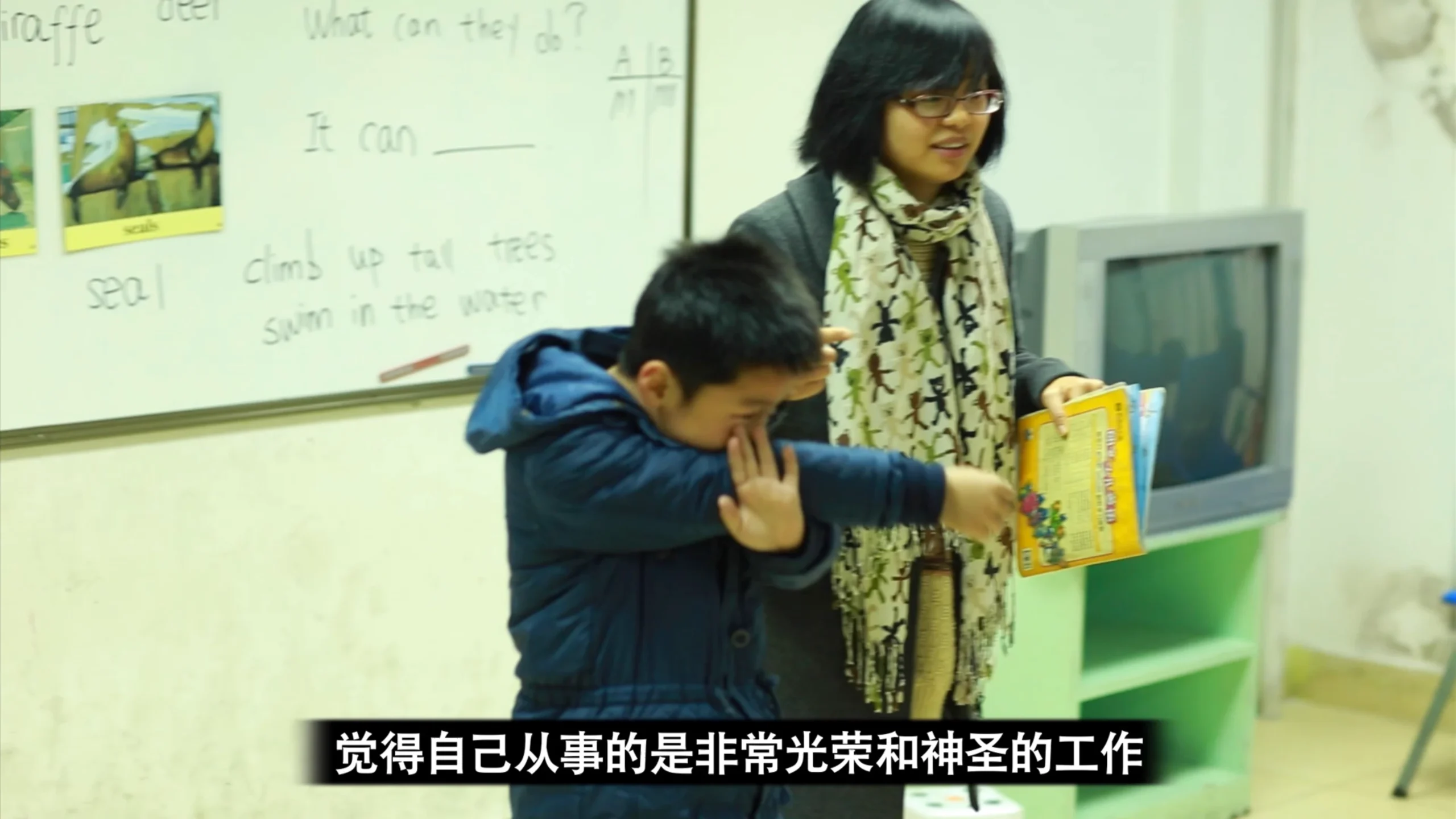 Still from the corporate tribute video for New Oriental School’s 10th anniversary (2013), teachers and staff reflecting on experiences in Beijing, China