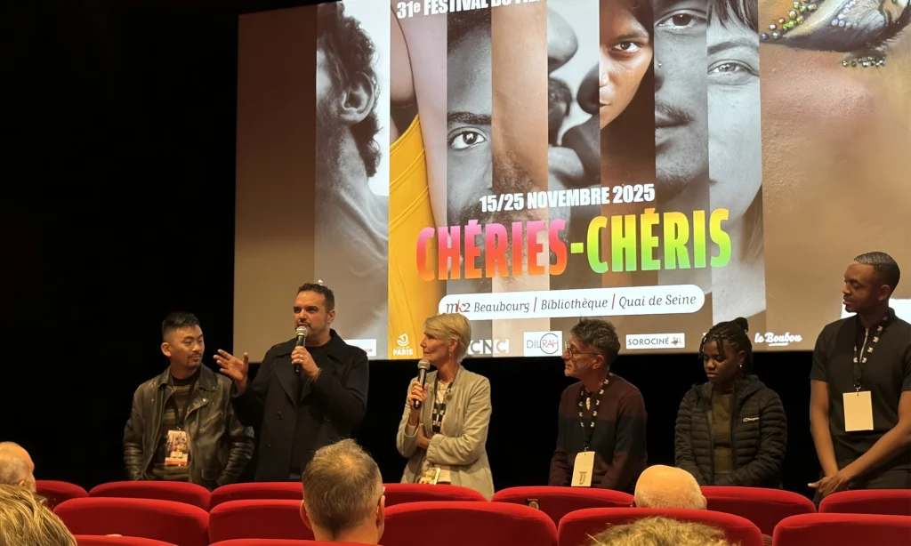 Directors Roberto F. Canuto and Xu Xiaoxi presenting the short film “IUS of Time” on stage together with Xu Xiaoxi, festival hosts, and other filmmakers at the 31st Chéries-Chéris LGBTQIA+ Film Festival in Paris, France.