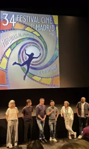 Directors Roberto F. Canuto and Xu Xiaoxi presenting the short film “IUS of Time” on stage at the 34th Madrid Film Festival (FCM-PNR), Spain, 2025.