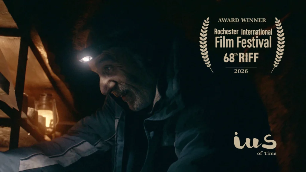IUS of Time film still with Xuan in a Cabrales cheese cave, awarded at the 68th Rochester International Film Festival