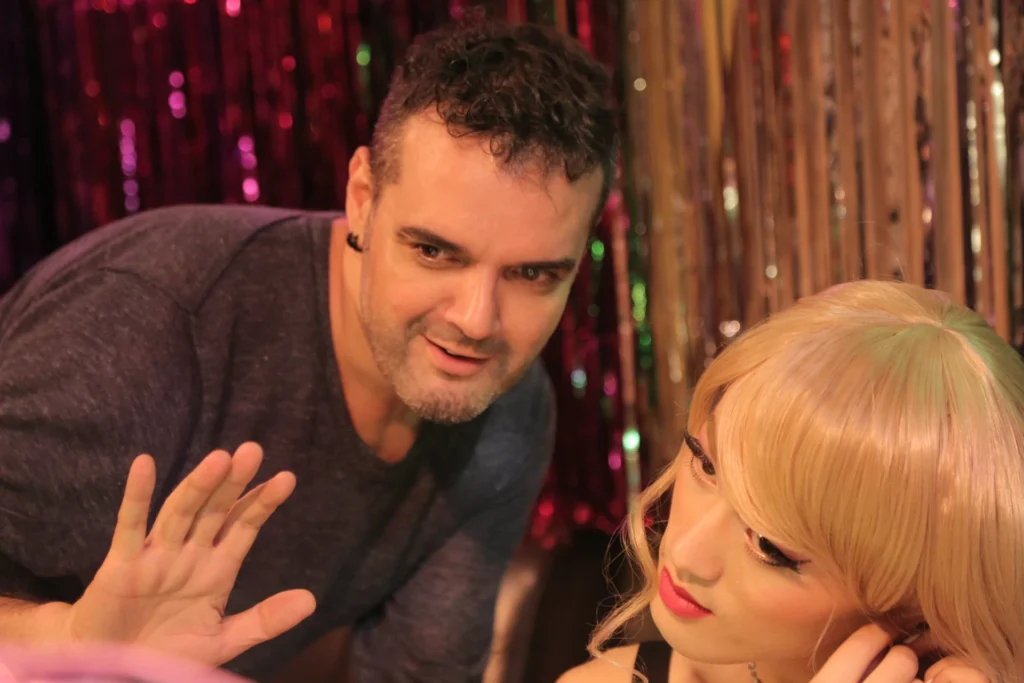 Roberto F. Canuto directing a cast member during filming of Sunken Plum