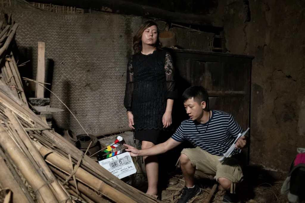 Clapperboard marking interior scene during filming of Sunken Plum