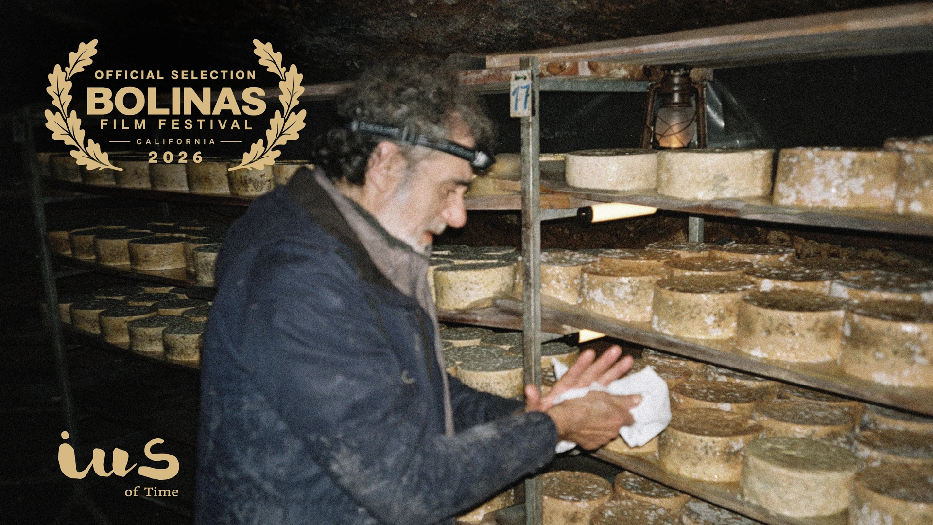 IUS of Time, a short film by Roberto F. Canuto and Xu Xiaoxi, official selection at the 4th Bolinas Film Festival, with Manuel Pizarro as Xuan in a Cabrales cheese cave